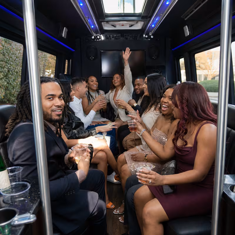 Black Mercedes Sprinter van staged for an Raleigh Birthday Transportation group