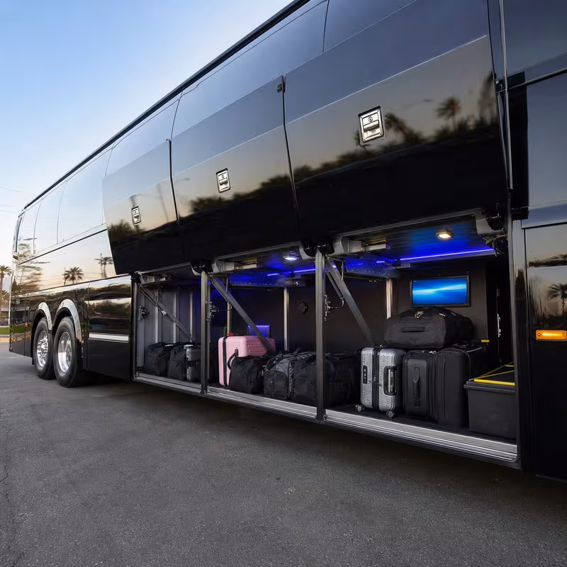 Party bus interior with wraparound leather seating and LED lighting in Raleigh